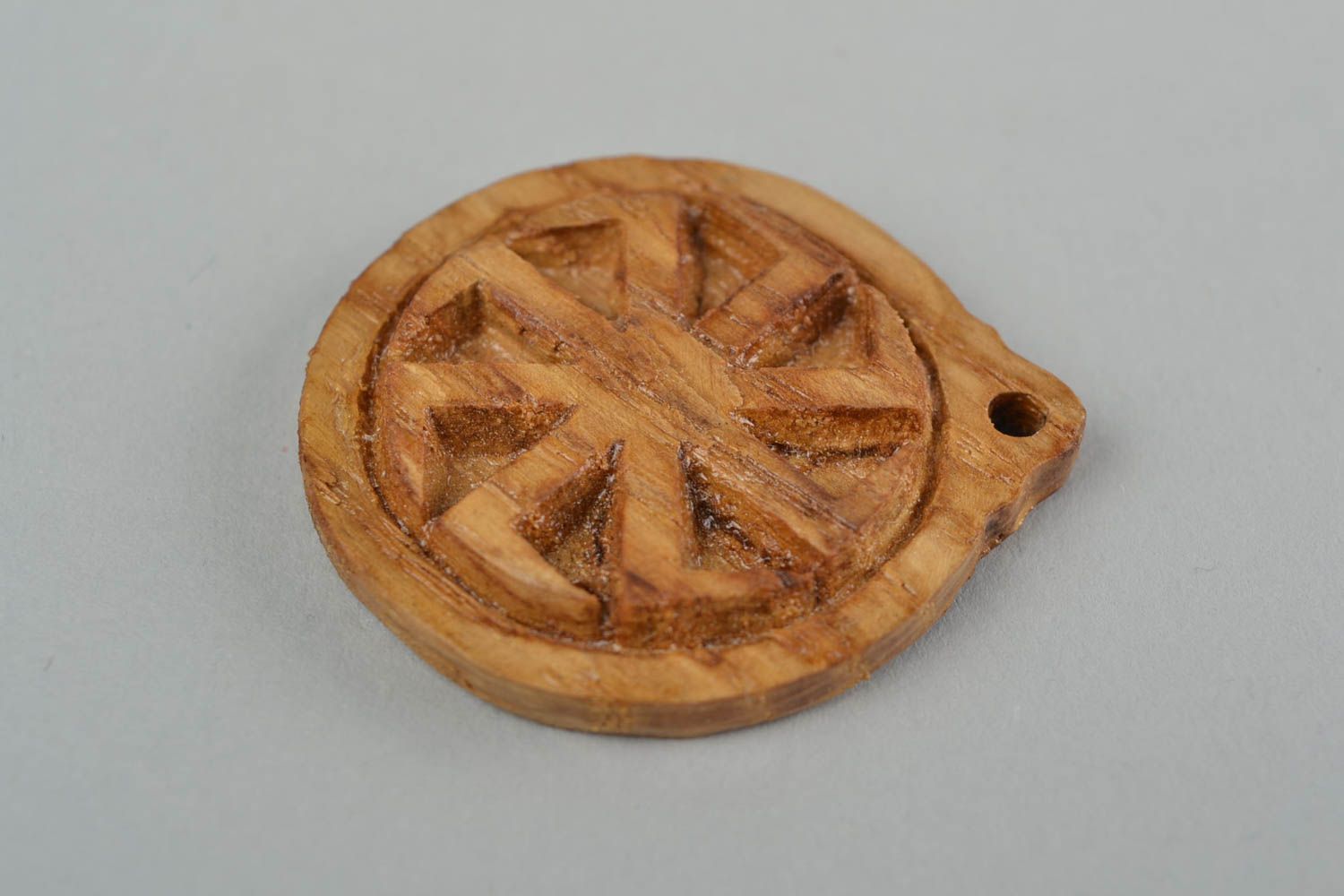 Handmade carved small round wooden neck pendant with Slavic symbol Kolovrat photo 4