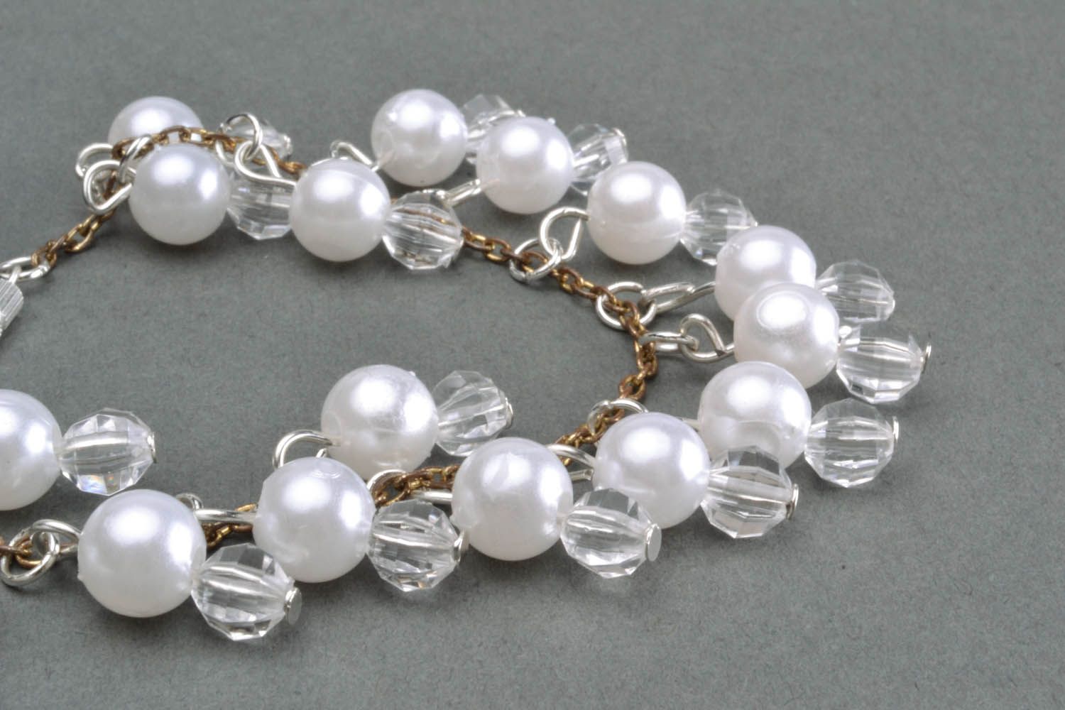 Bracelet made of white beads photo 5
