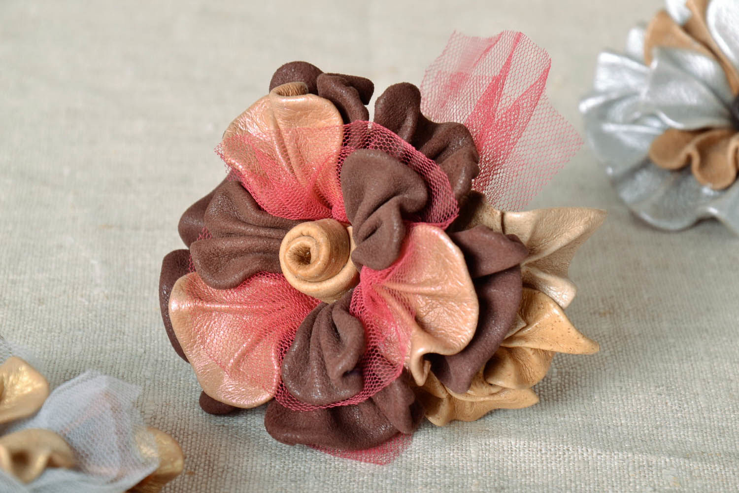 Leather brooch in the shape of a flower photo 1