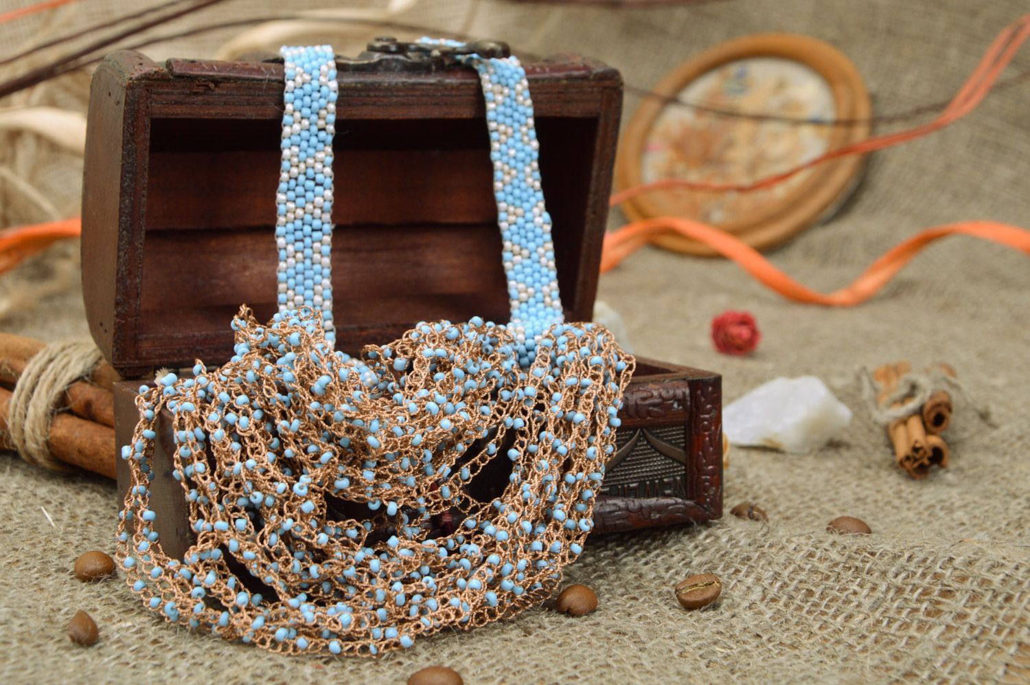 Handmade airy volume necklace woven of blue and brown beads and fishing line photo 1