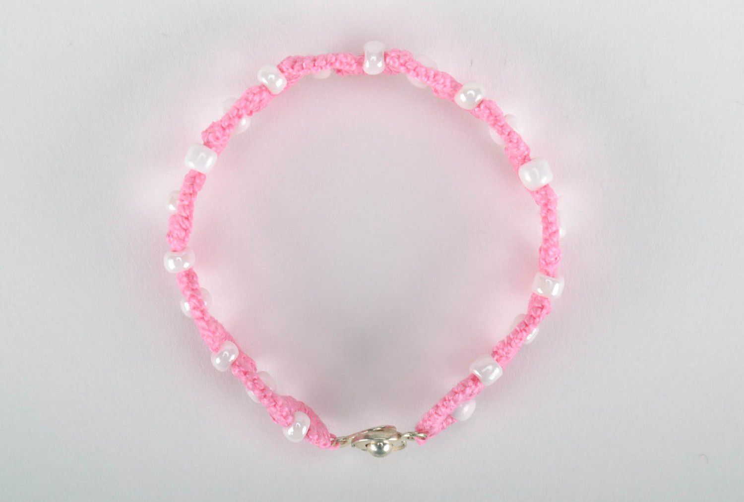 Bracelet braided from cotton threads white and pink photo 4