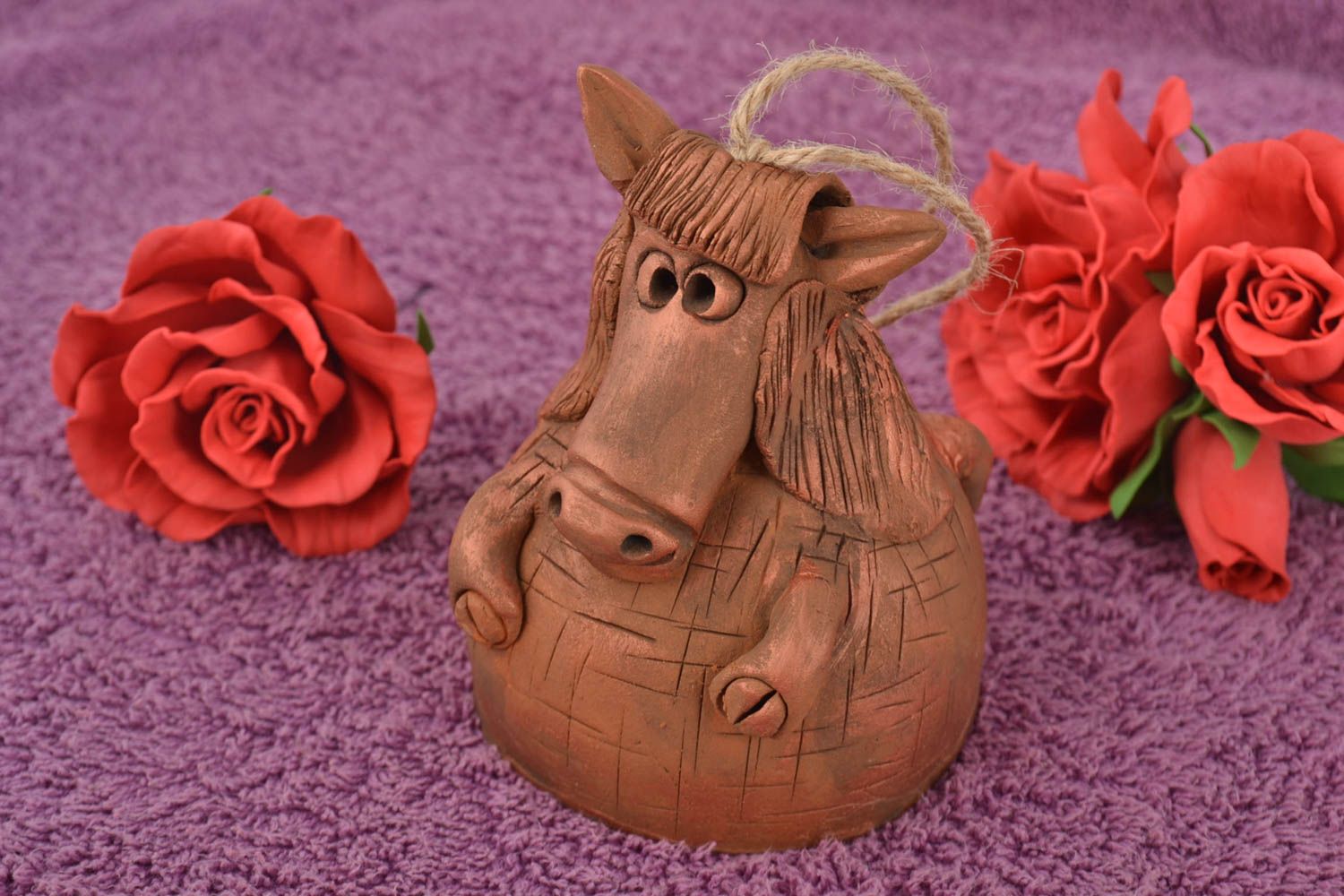 Handmade clay bell in shape of horse wall pendant on lace photo 1
