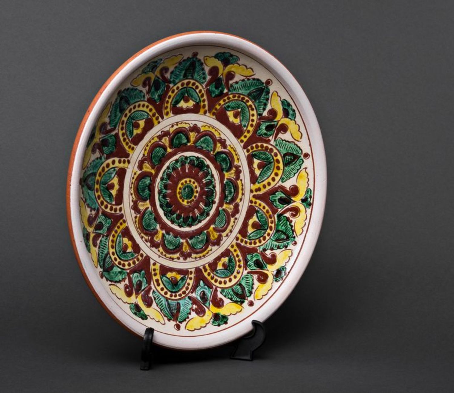 Ceramic plate in ethnic style photo 2