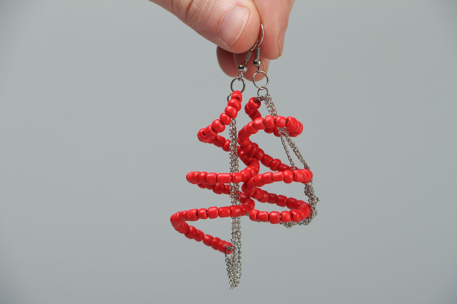 Long earrings with red plastic beads photo 3