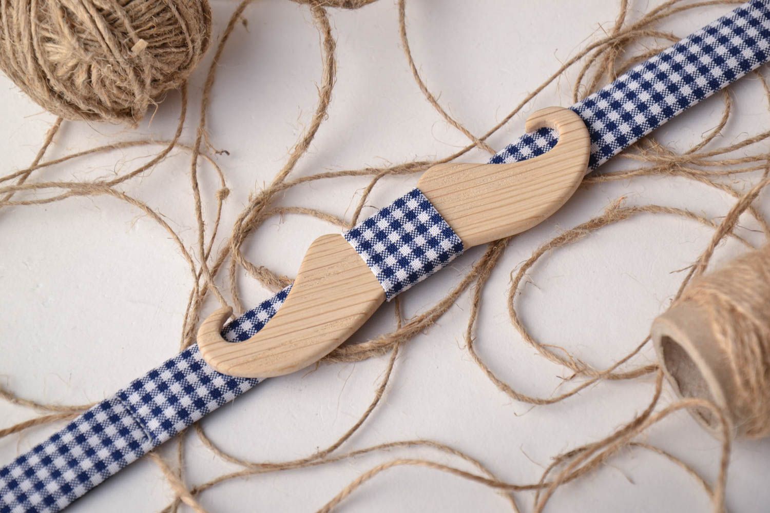 Wooden bow tie in the shape of moustaches photo 1