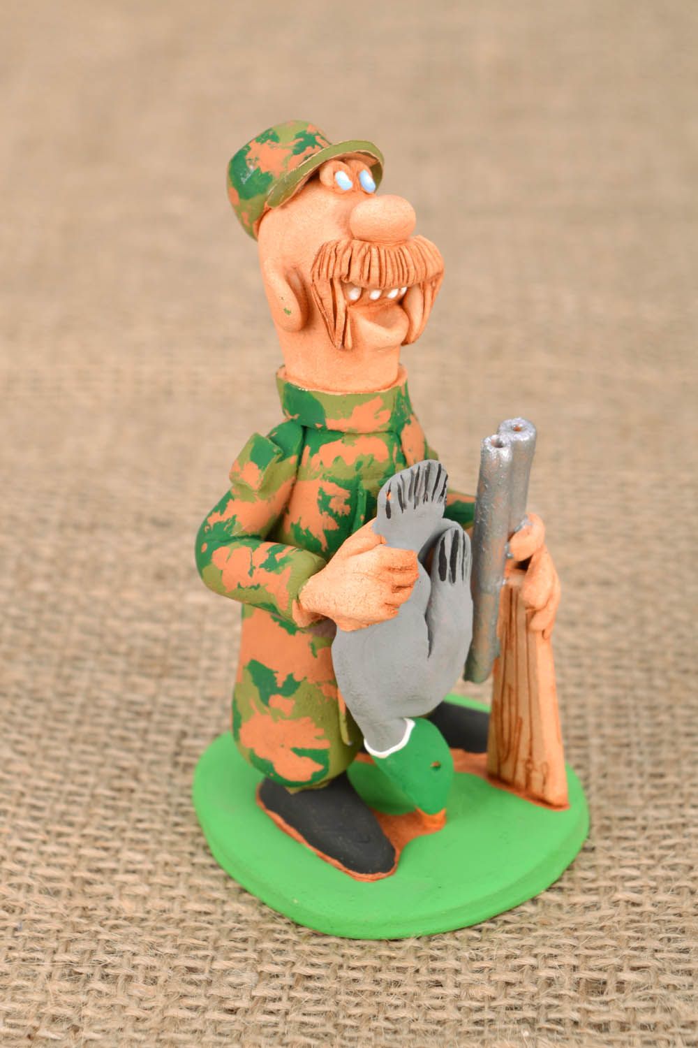 Figurine Hunter with a Gun and Duck photo 1