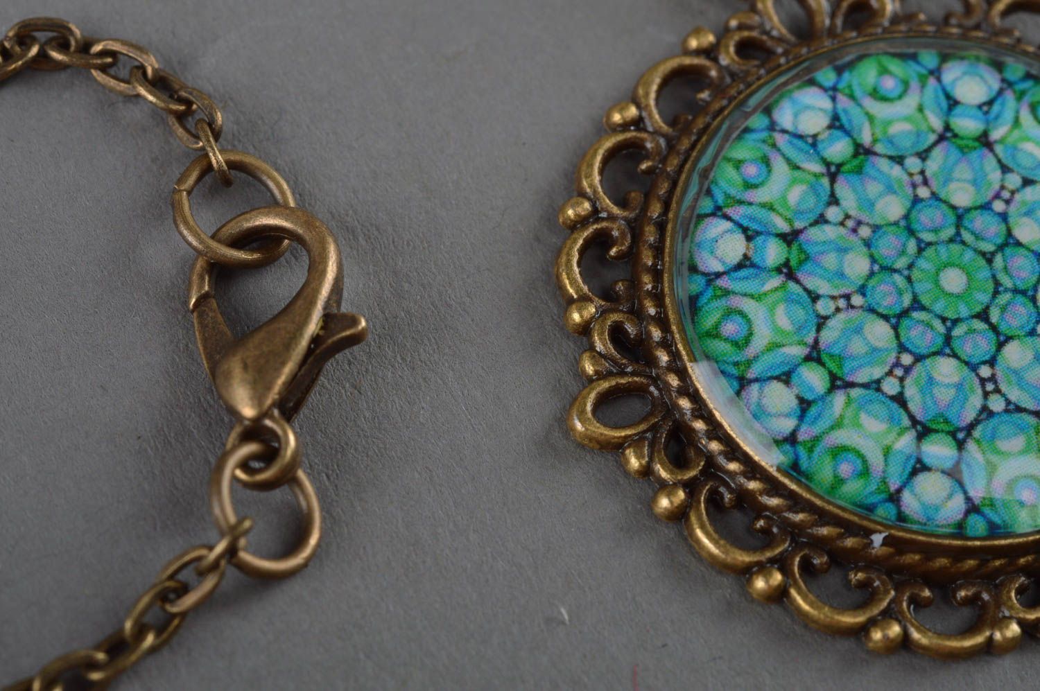 Epoxy-coated round handmade blue pendant with flower print stylish accessory photo 3