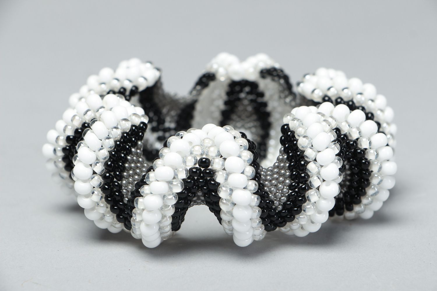 Handmade black and white beads bracelet on elastic cord photo 1