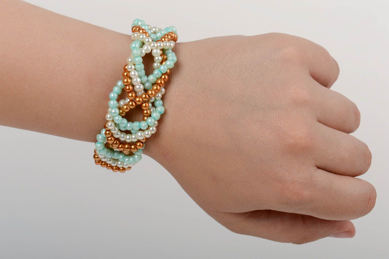 Handmade woven wrist bracelet with colorful light ceramic pearls for women photo 4