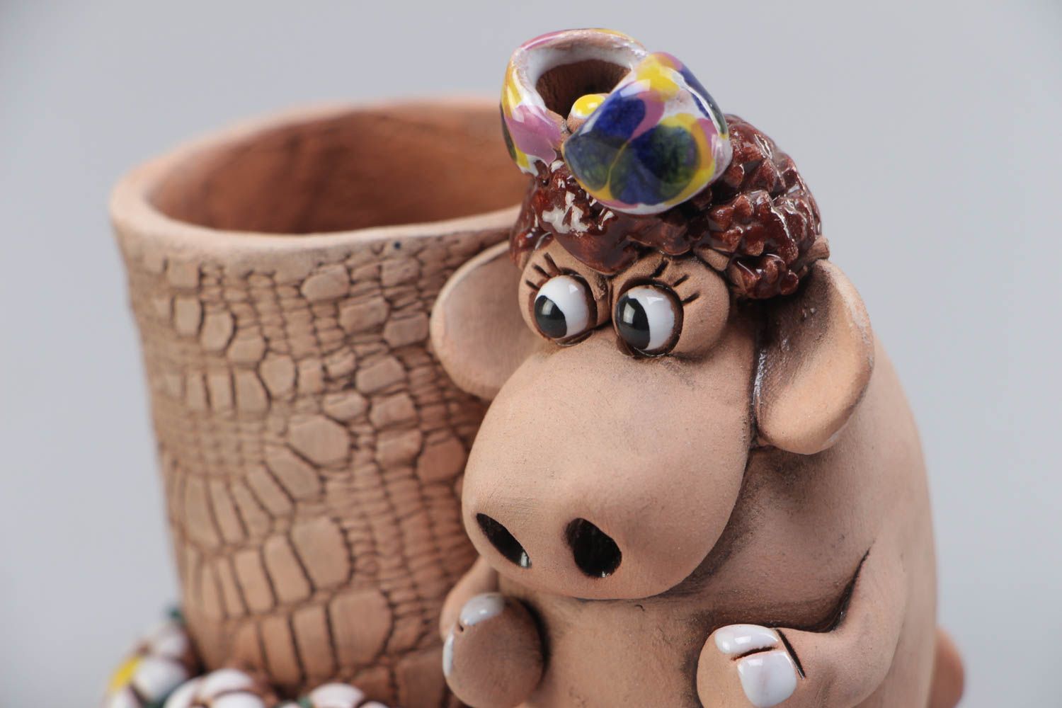 Handmade interior beautiful ceramic stand for pens and pencils with funny cow figurine photo 2