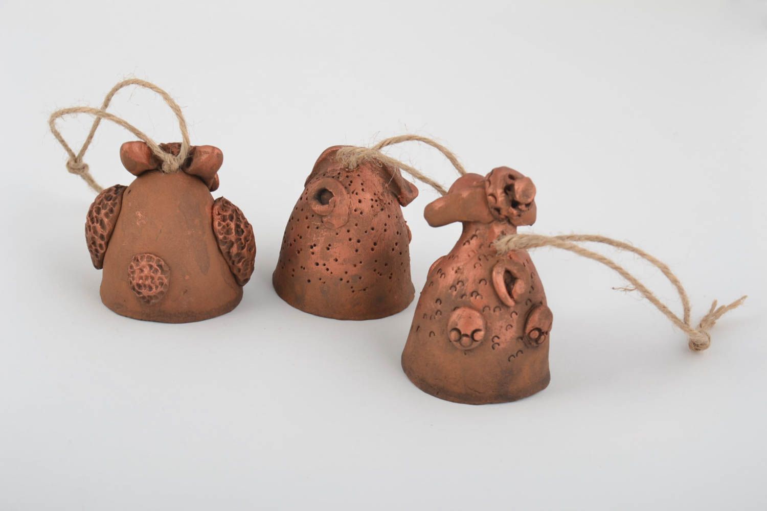 Set of handmade designer painted ceramic bells 3 pieces in the shape of animals photo 3