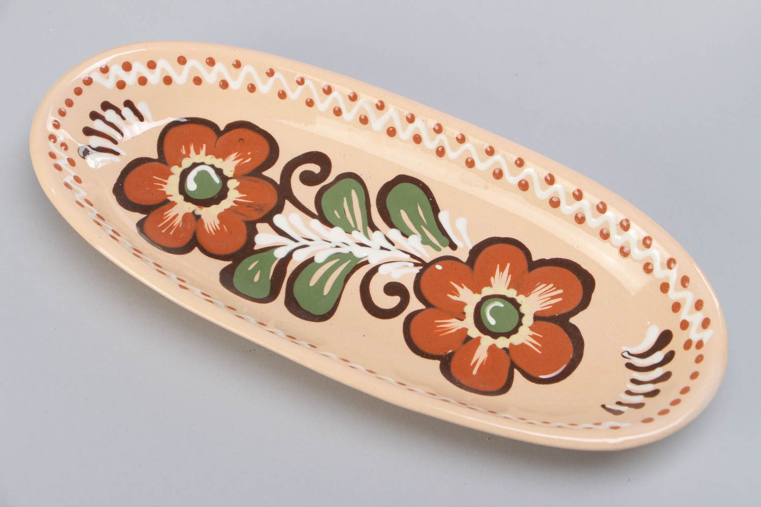 Handmade long ceramic dish painted and glazed with floral ornament for fish photo 3