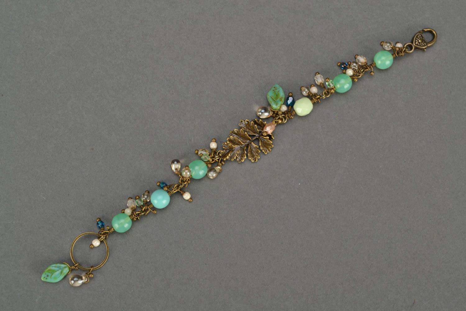 Female beautiful handmade jewelry made of glass beads bracelet and earrings photo 3