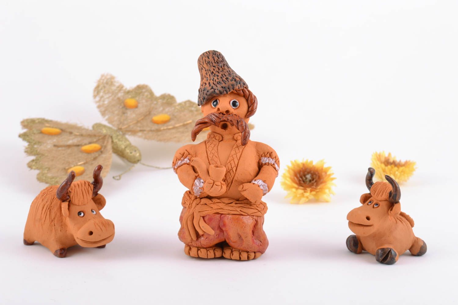 Set of 3 handmade ceramic figurines in ethnic style the Cossack with 2 bulls photo 1