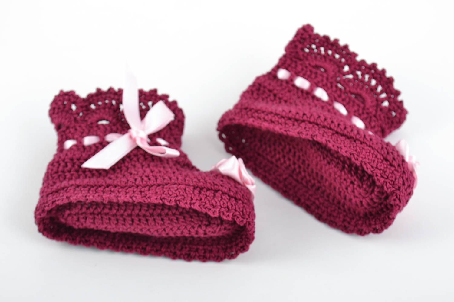 Handmade crocheted lacy baby booties of purple color with pink satin ribbons photo 2