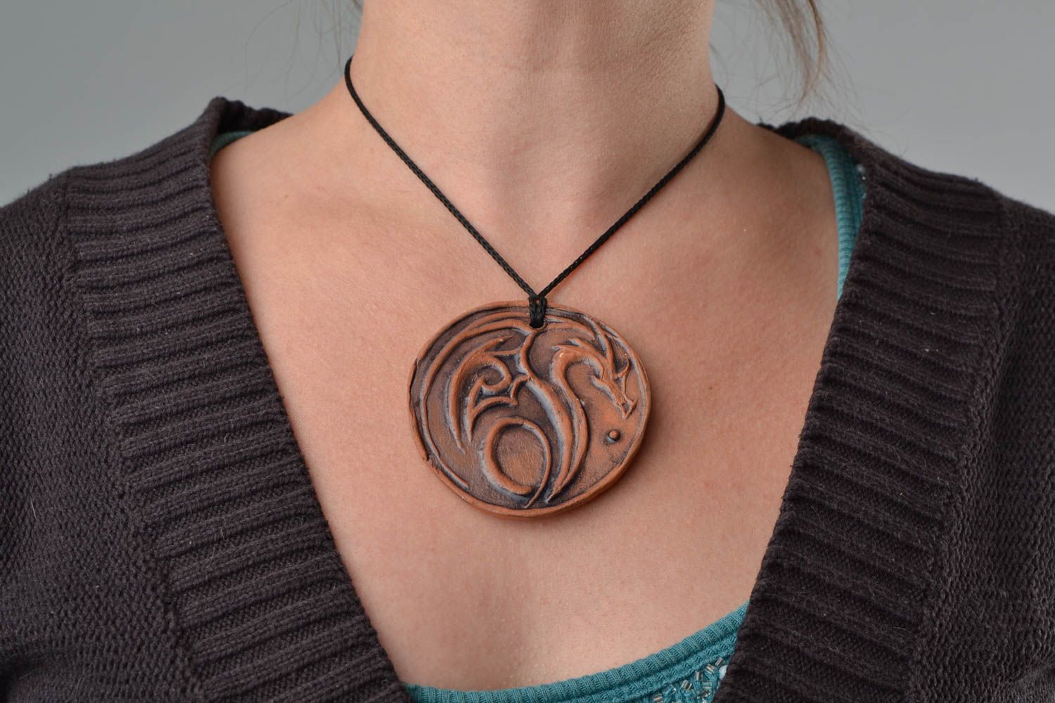 Handmade large brown ceramic round pendant with dragon image photo 2
