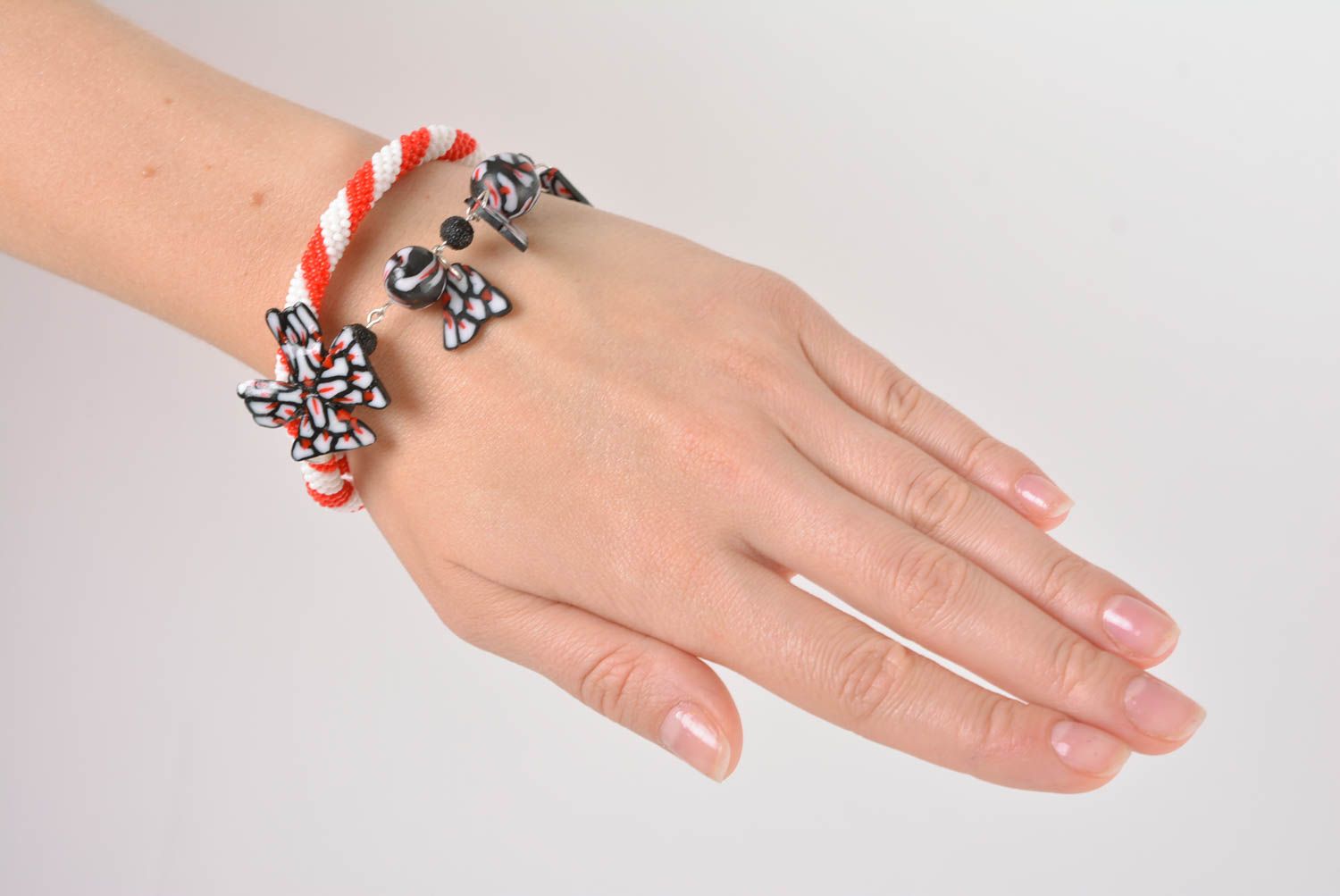 Handmade white and orange beaded cord wrist bracelet with polymer clay charm photo 2