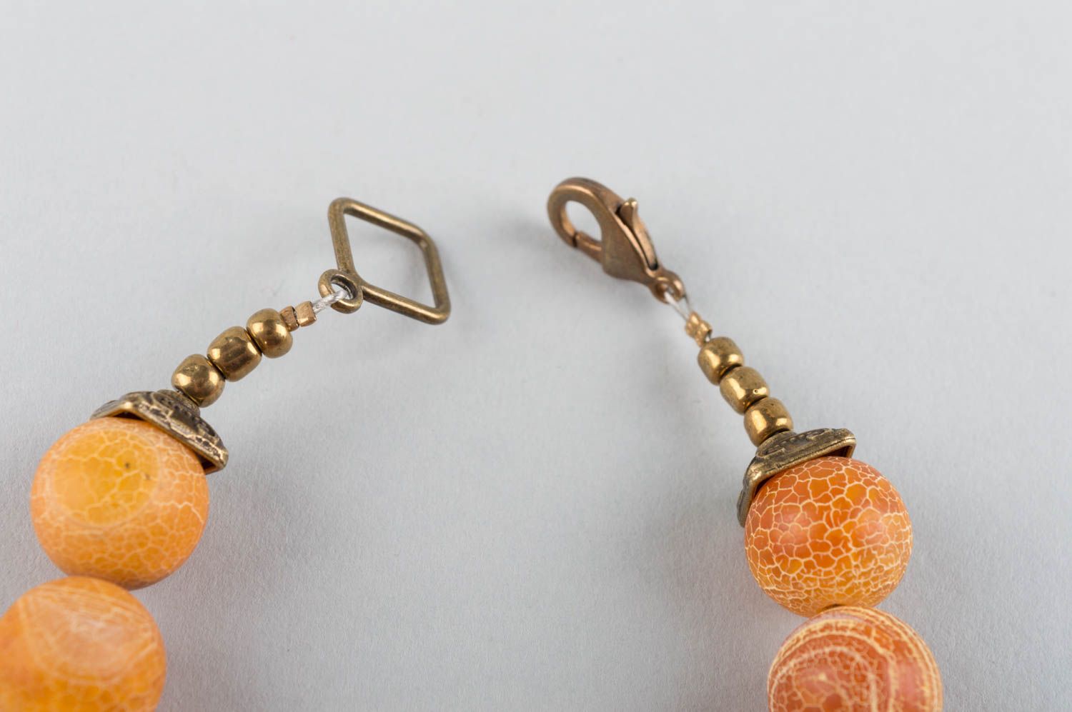 Beautiful elegant orange designer handmade bracelet made of agate and brass photo 3