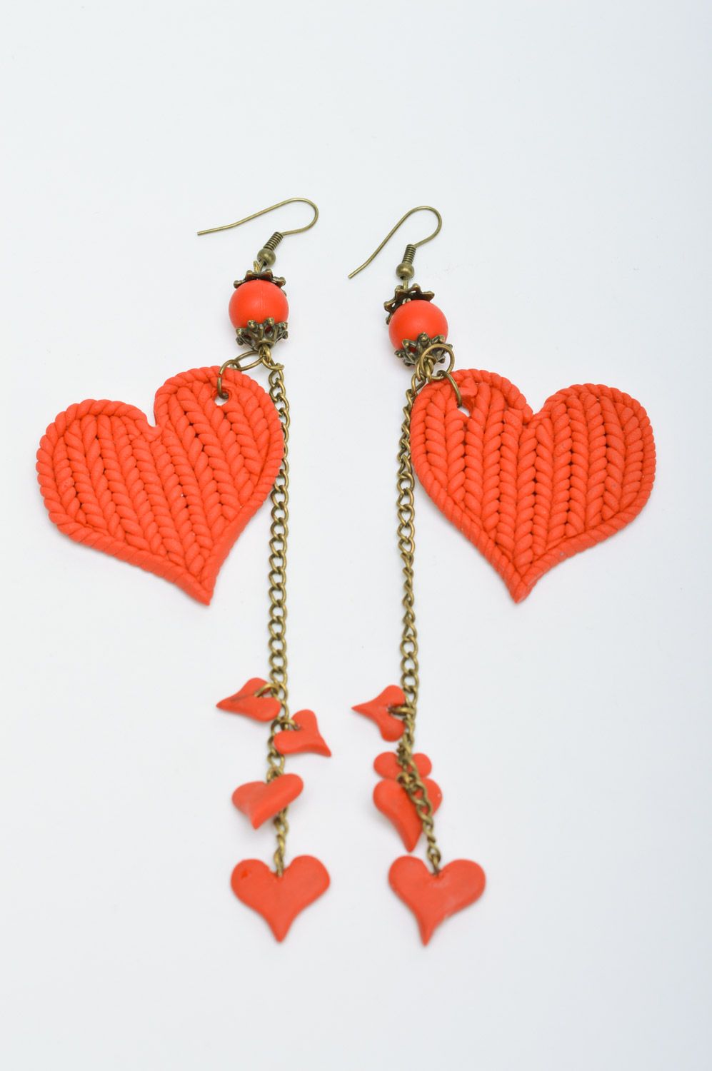 Long handmade earrings with red heart charms and with  knitted texture photo 2
