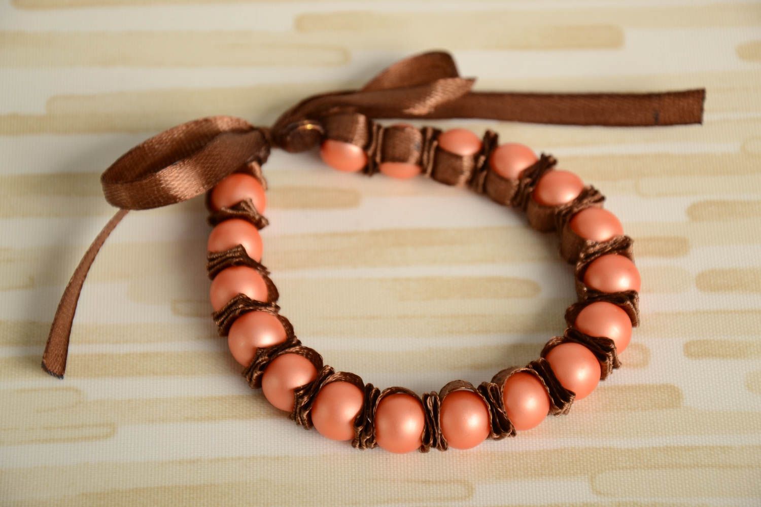 Brown handmade woven wrist bracelet with satin ribbon and glass beads Candy photo 1