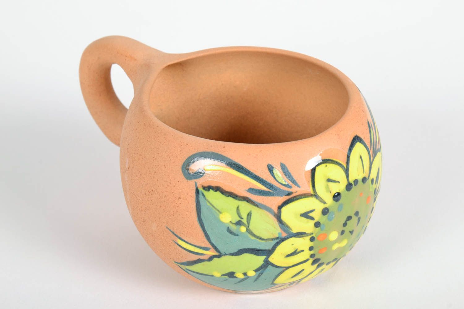 Natural clay rustic cup with handle and lime and yellow color floral pattern photo 4