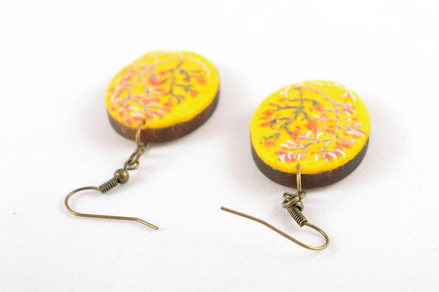 Bright yellow earrings of oval shape with embroidery photo 4