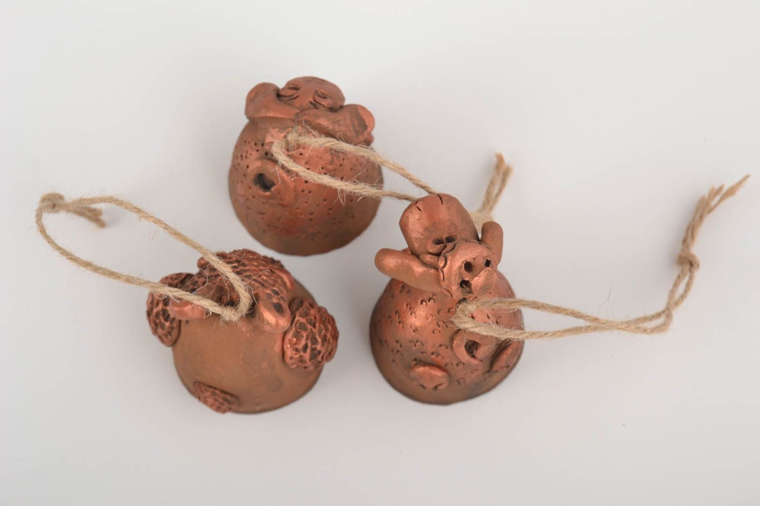 Set of handmade designer painted ceramic bells 3 pieces in the shape of animals photo 4