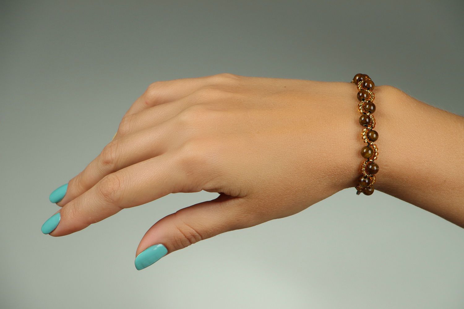 Wrist bracelet made of brown onyx photo 4