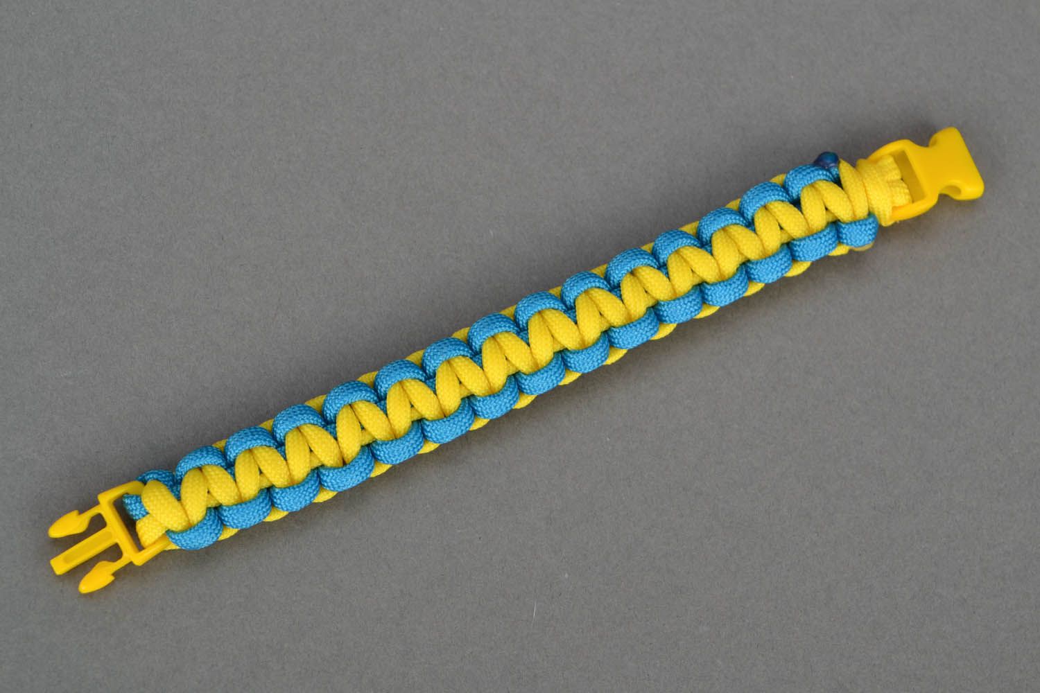 Bracelet en paracorde jaune et bleu fait main photo 4