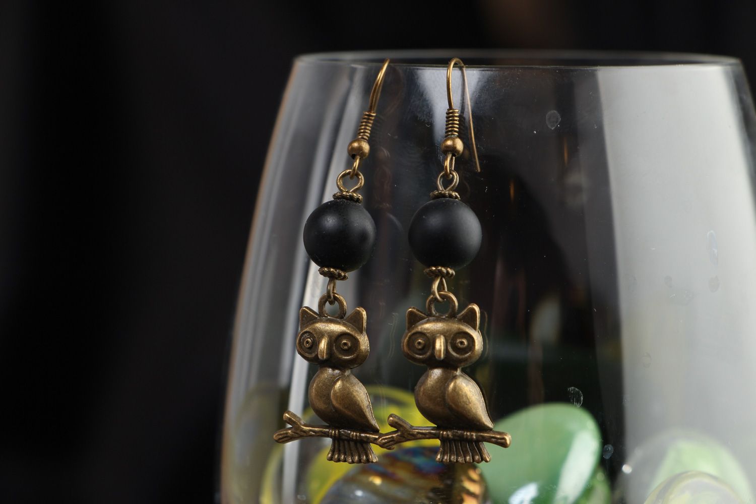 Handmade dangle earrings with shungite beads and metal charms in the shape of owls photo 4