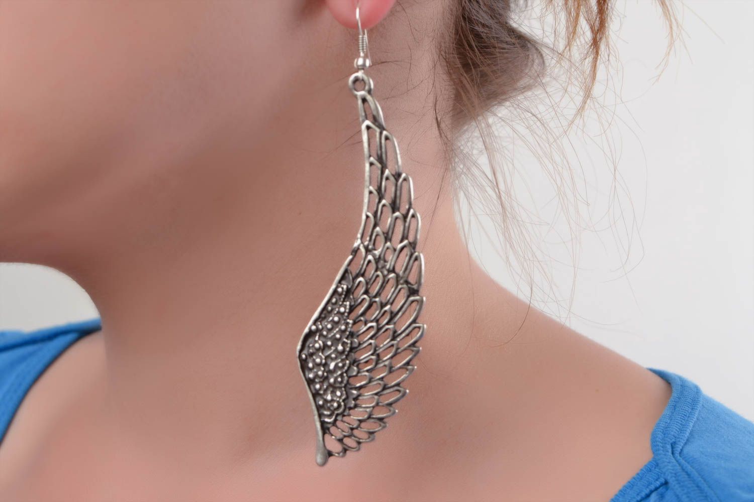 Handmade designer long dangling earrings Wings cast of metal alloy for women photo 2