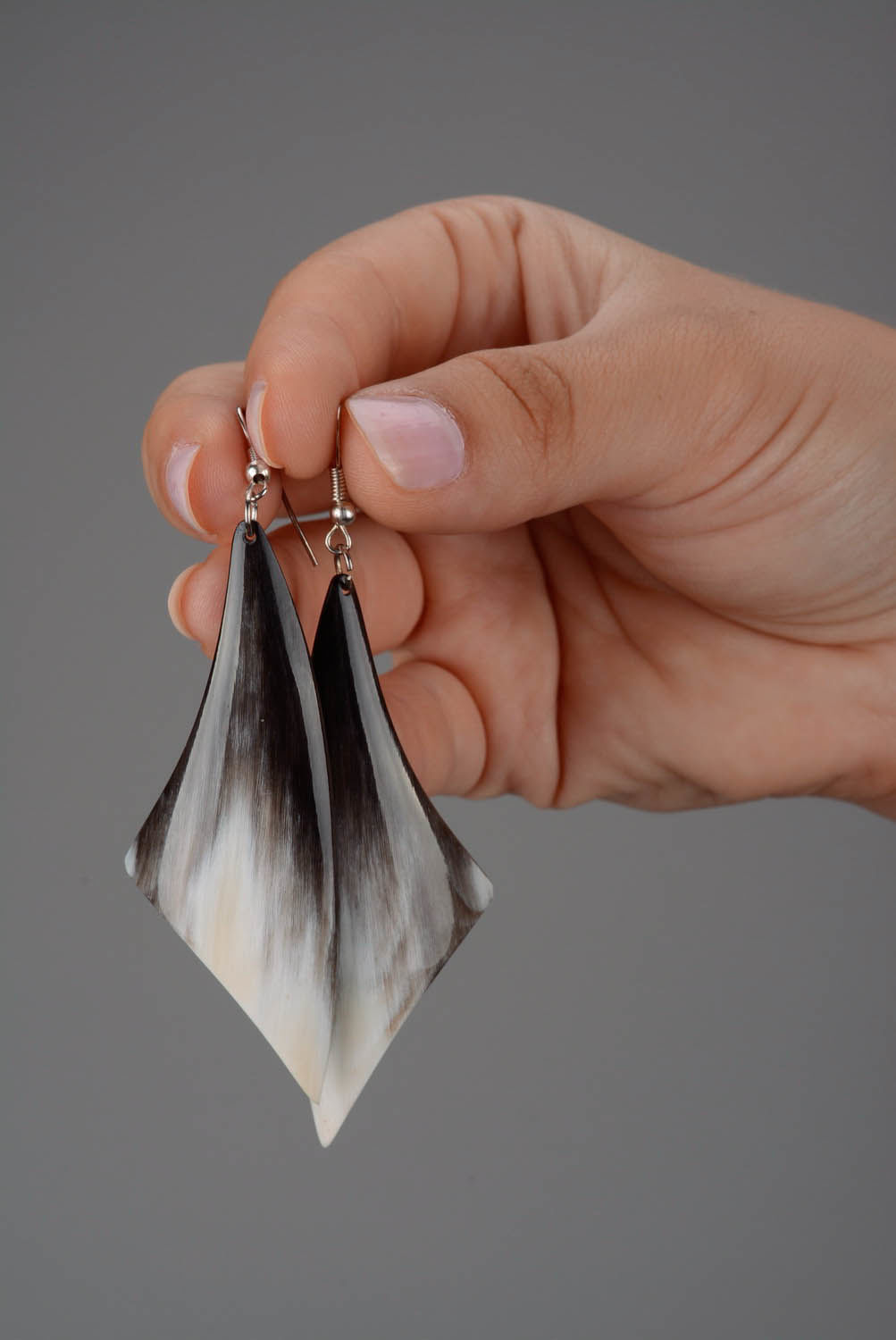 Earrings made ​​of cow horns Feathers photo 5