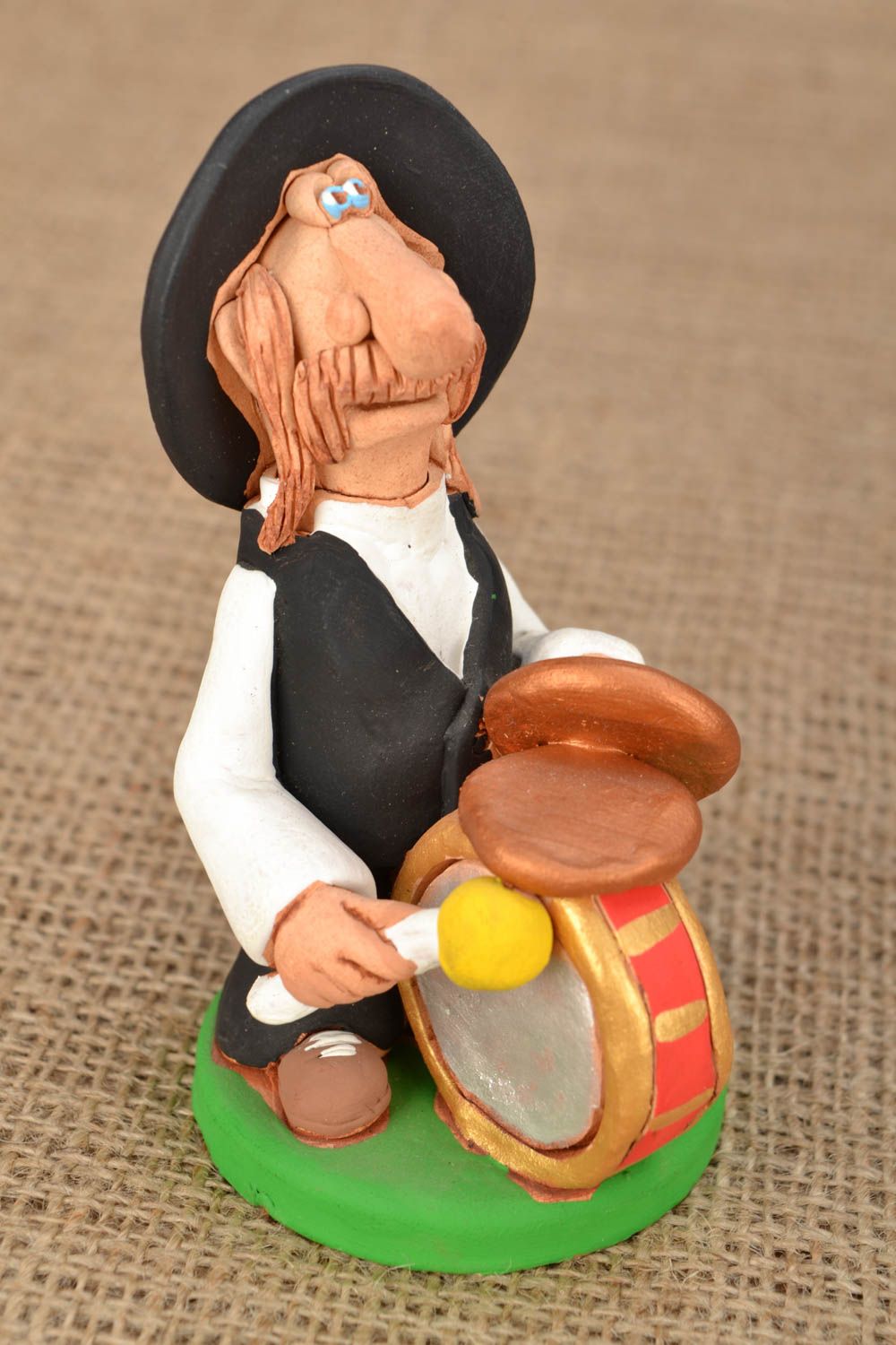Homemade clay figurine Man with Drum photo 1