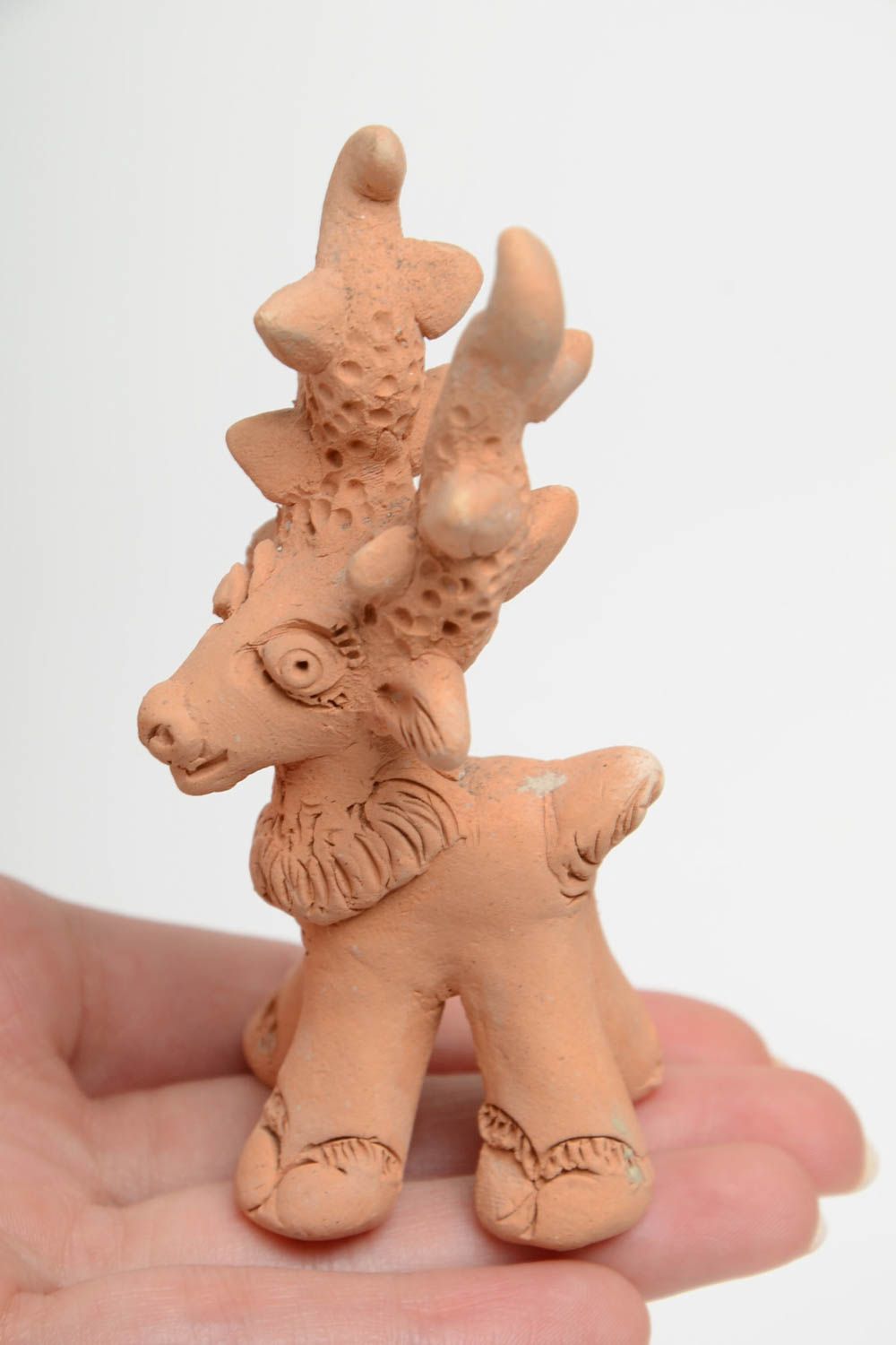Handmade small unpainted ceramic figurine of deer for interior decoration photo 5