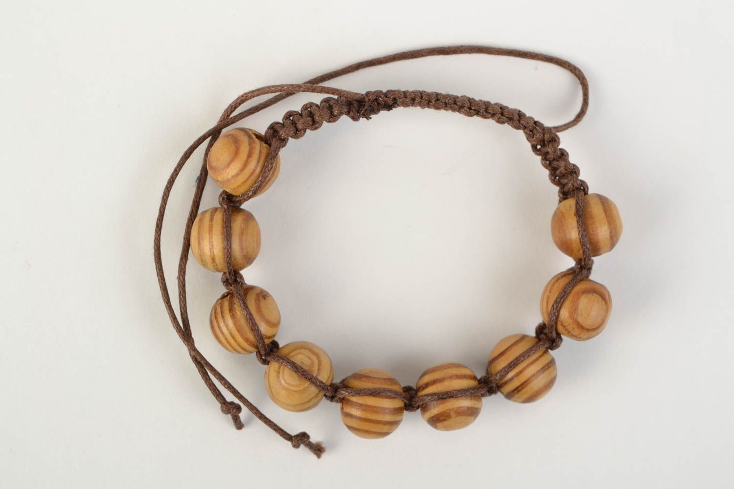 Handmade designer woven cotton cord bracelet with wooden beads photo 6
