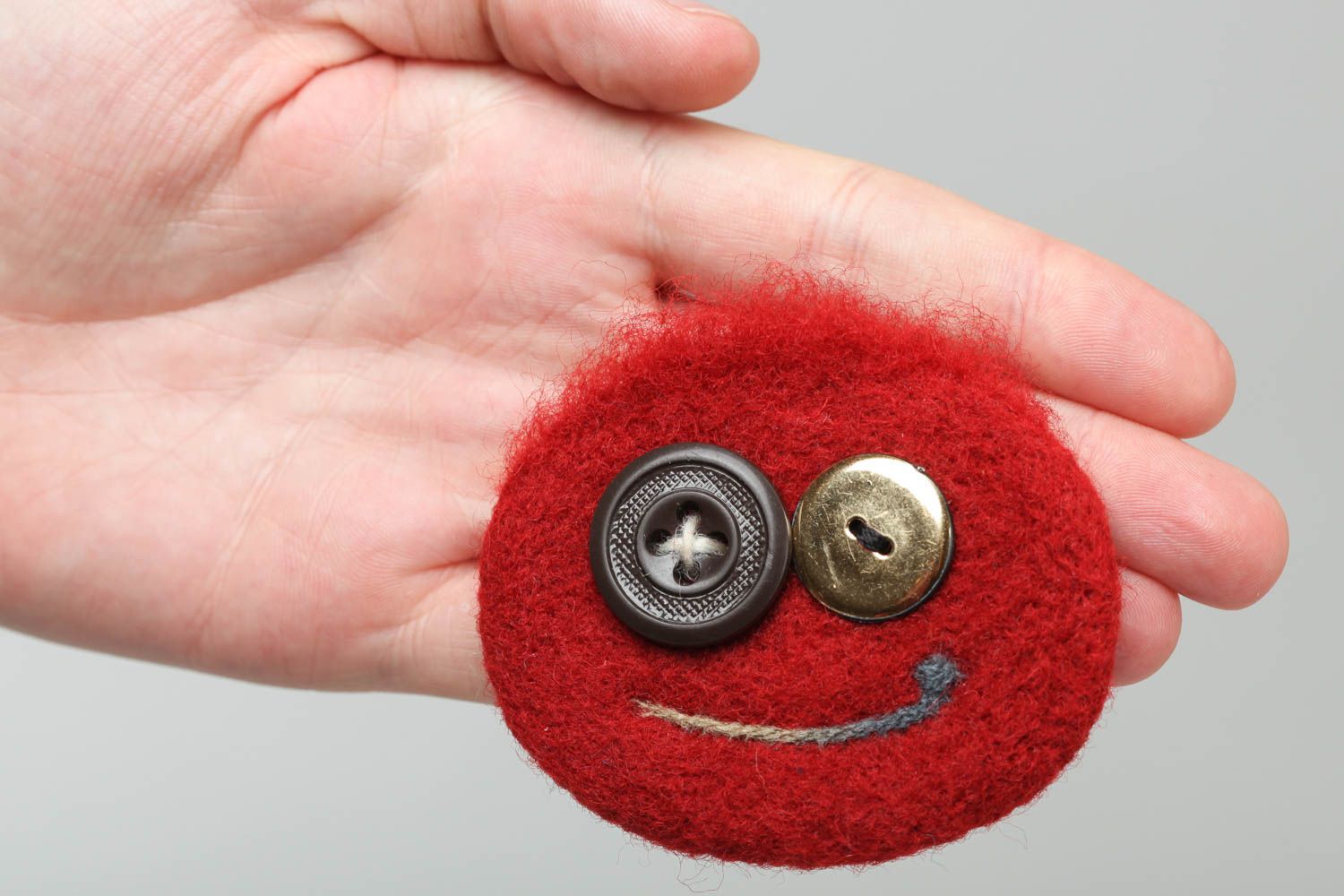 Brooch made of felted wool funny red round accessory with buttons hand made photo 5