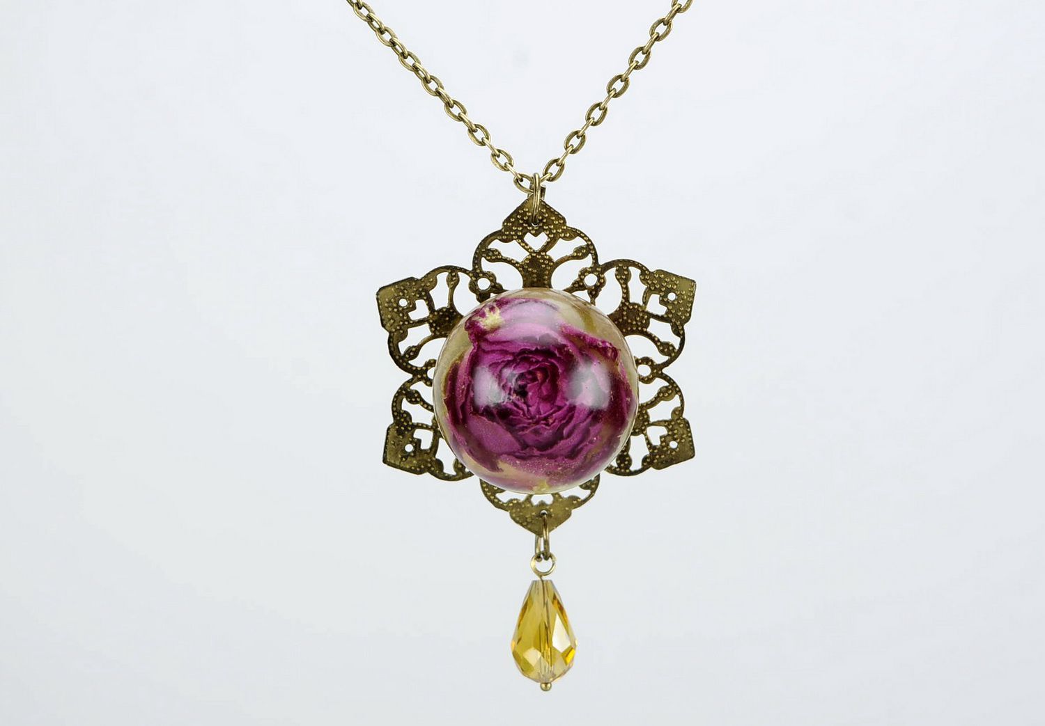 Pendant covered with epoxy Maroon Rose photo 1