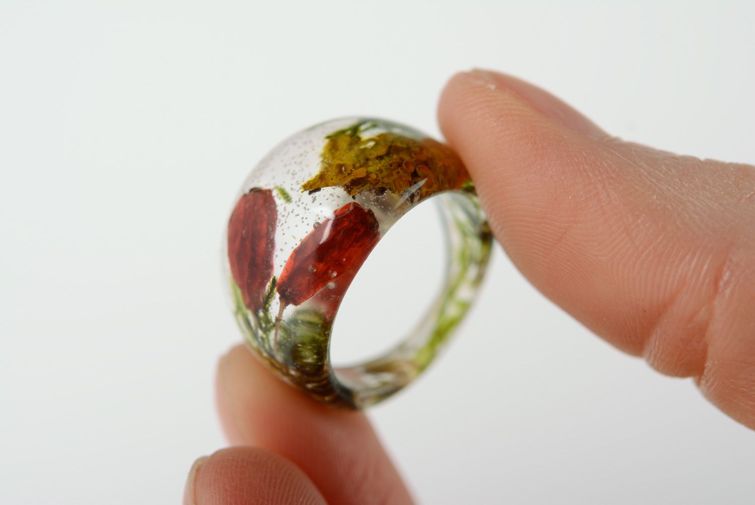 Unusual handmade transparent ring with barberry and moss coated with epoxy resin photo 2