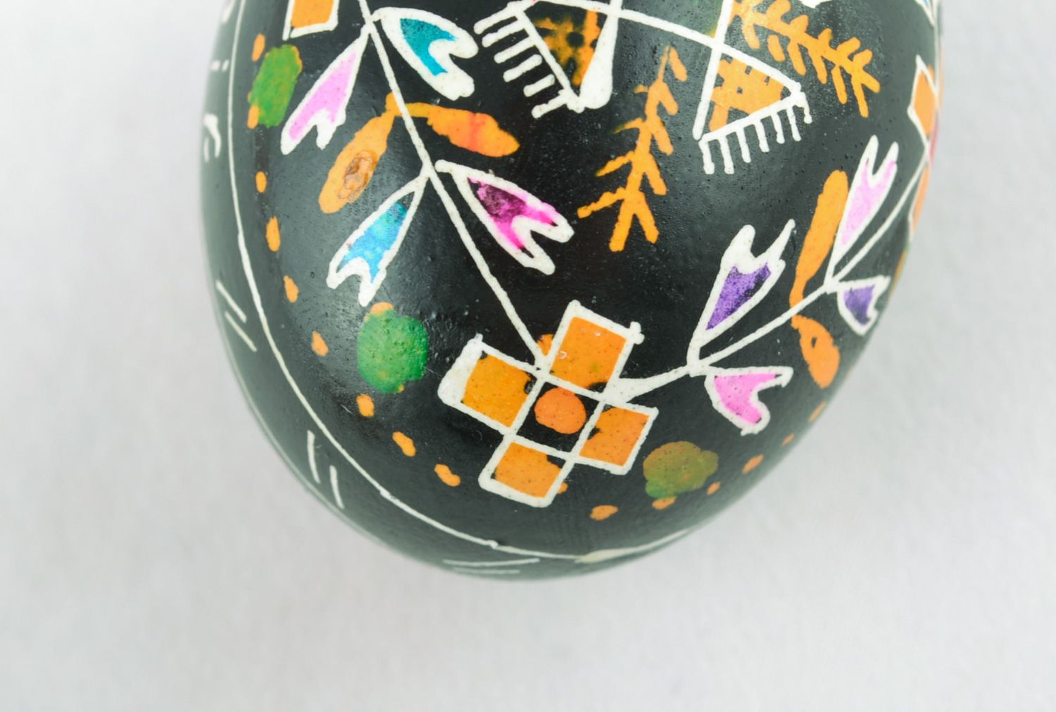 Homemade Easter egg painted with wax photo 3
