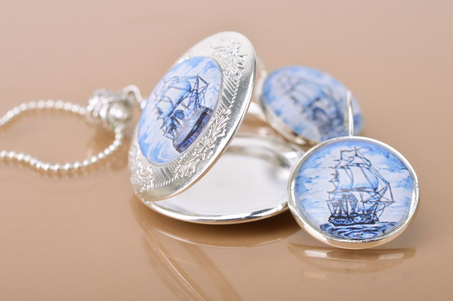 Handmade set in marine style of metal jewelry earrings and locket pendant with space for photo  photo 5