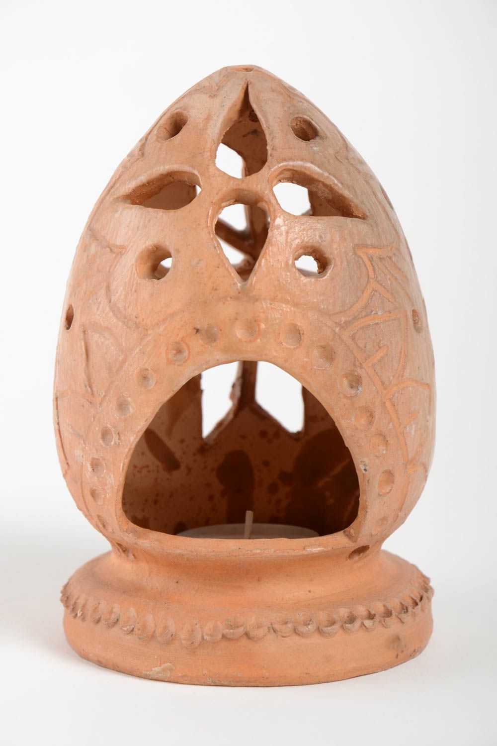 Глиняный подсвечник в форме яйца ручной работы покрытый воском красивый фото 2