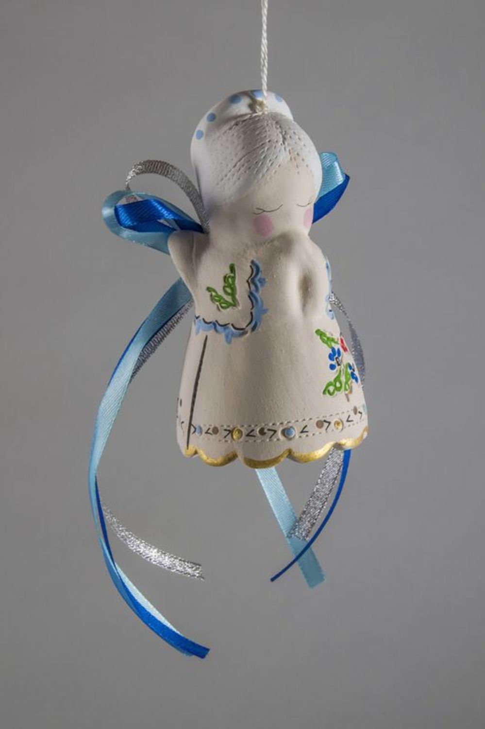 Clochette blanche en céramique avec rubans bleus photo 1