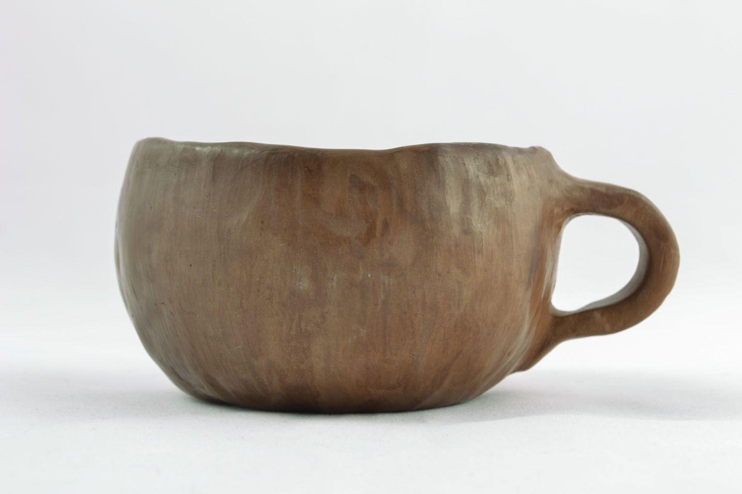 Handmade clay mug photo 1
