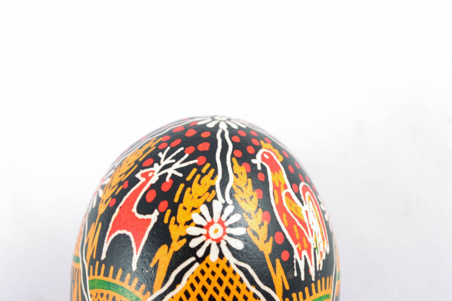 Handmade Easter egg with bright painting in Ukrainian style photo 5