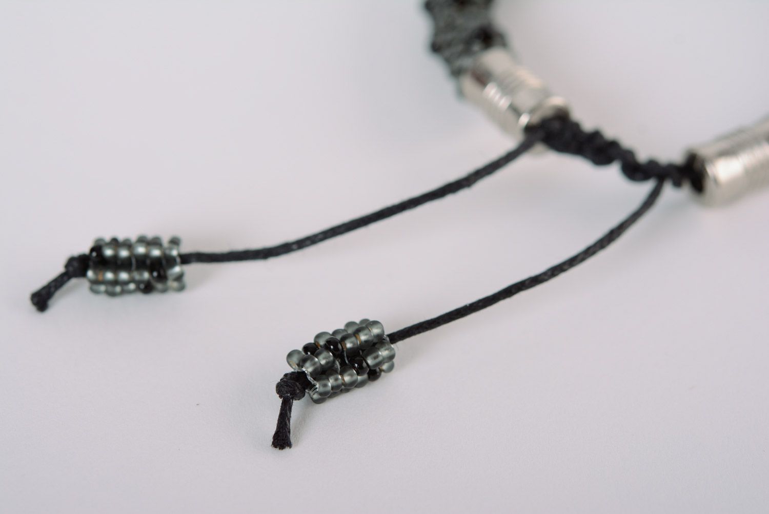 Handmade black beaded cord wrist bracelet with ties photo 4