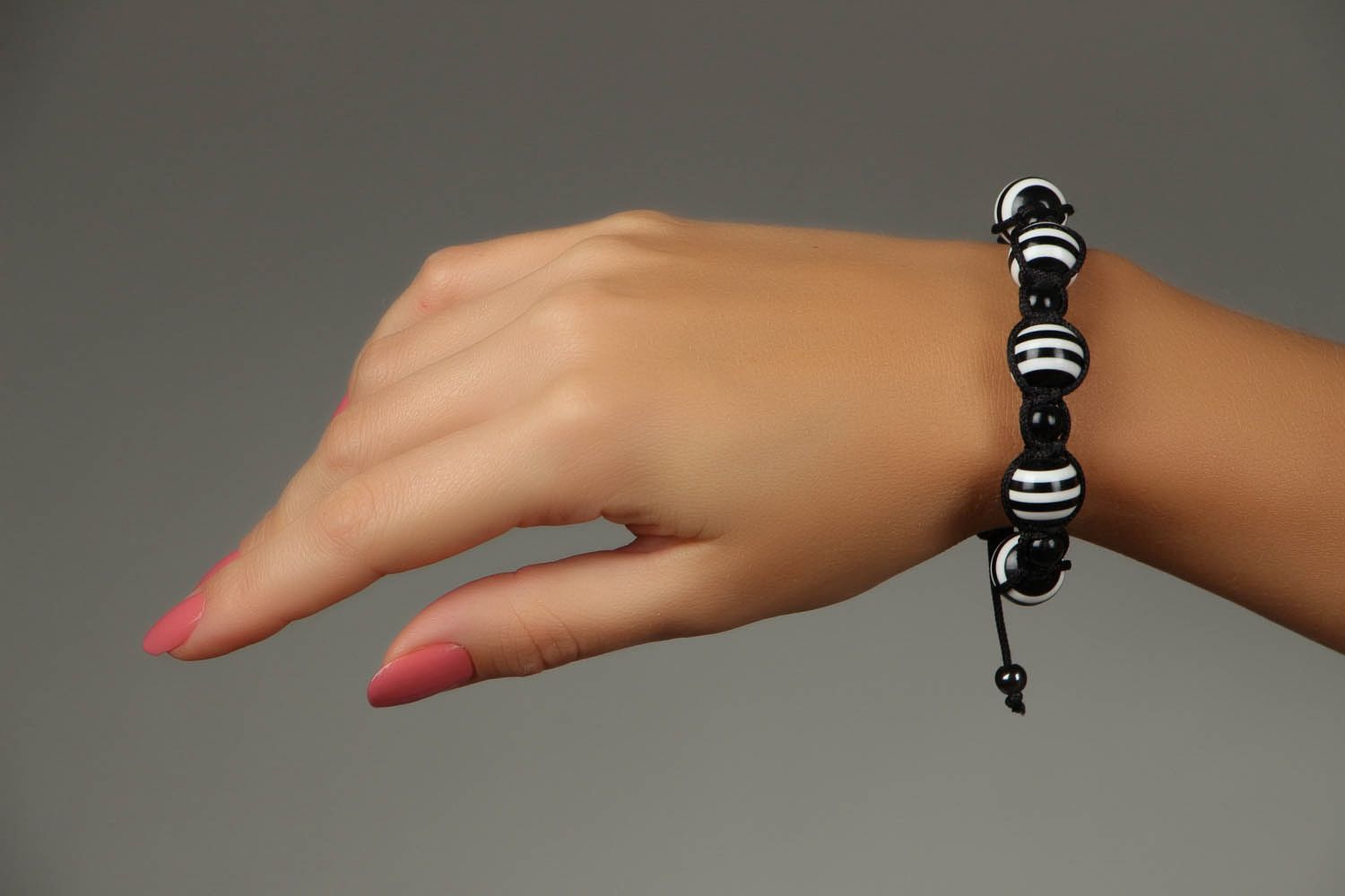 Black and white braided bracelet with beads photo 6