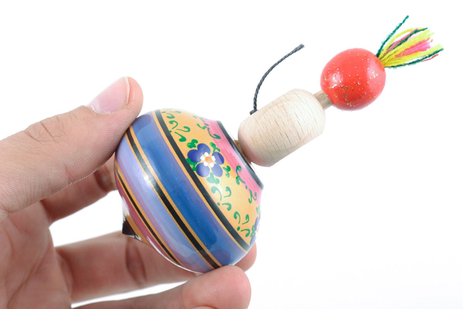 Handmade painted wooden spinning top toy for fine motor skills development photo 2