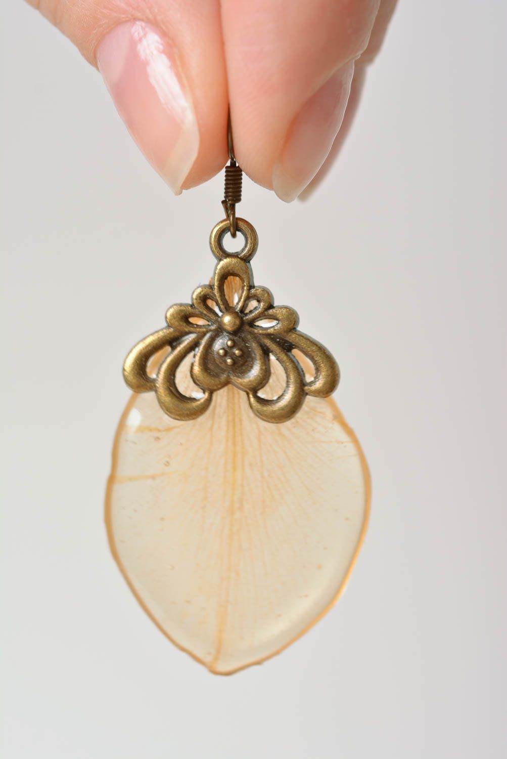 Handmade designer dangle earrings with transparent flower petal in epoxy resin photo 2