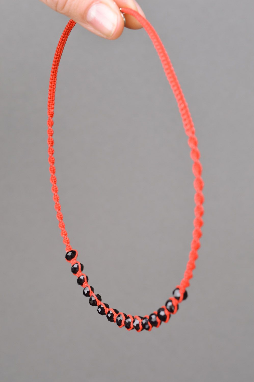 Handmade necklace woven of red threads and black beads on wire frame for women photo 3