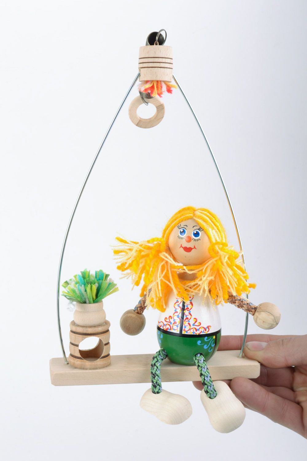 Игрушка из дерева на пружинке ручной работы в виде клоуна экологически чистая фото 1
